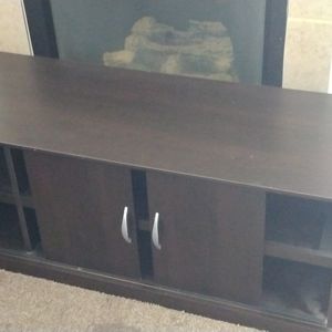 Selling a tv stand with two doors open shelves